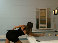 mika is playing billiards photo 2