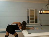 mika is playing billiards photo 3