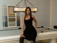 mika is playing billiards photo 5