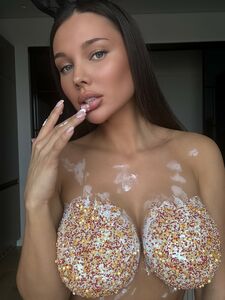 Glamorous OnlyFans doll Monomur Fit playing with her hot large breasts photo 1