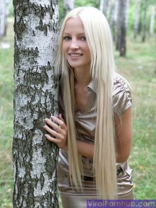 Beautiful teen Alysha A strips naked after giving a pantyless upskirt outdoors photo 17