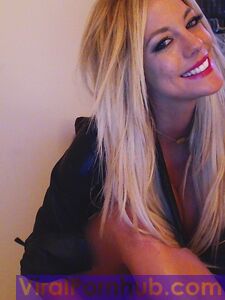 Smiling Blonde Chick Xo Gisele Is Playing With Her Enormous Boobs Before The Camera photo 3