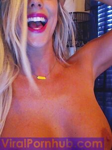 Smiling Blonde Chick Xo Gisele Is Playing With Her Enormous Boobs Before The Camera photo 14