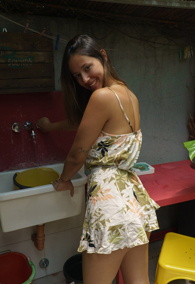 Stunning brunette babe taking a bath outside displaying her amazing slender figure with big natural knockers