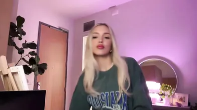 Abby Rao's Seductive Tease and Strip on Live Stream