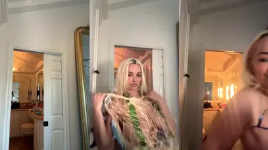 Lindsey Pelas Teases with Strawberry Syrup on Her Naked Body