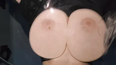 Vixen Virago Rubs Her Massive Breast On A Glass