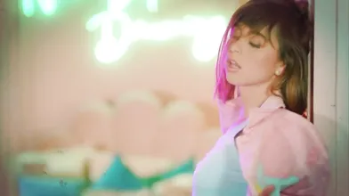 Dominatrix Lily Philips Strips Seductively