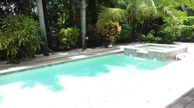 Ambie Bambi Gives A Blowjob On The Pool