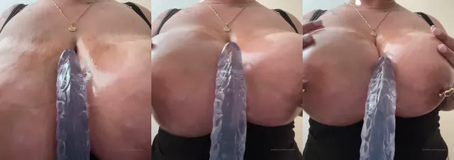 Breecandace Squeezing Dildo Between Her Tits