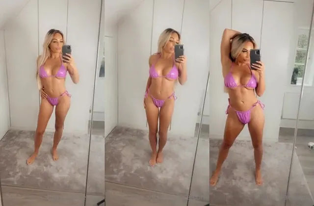 Ava-Grace verführt im leuchtend rosa Bikini