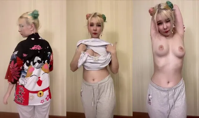 Kittie_Meo si spoglia e stuzzica il suo corpo