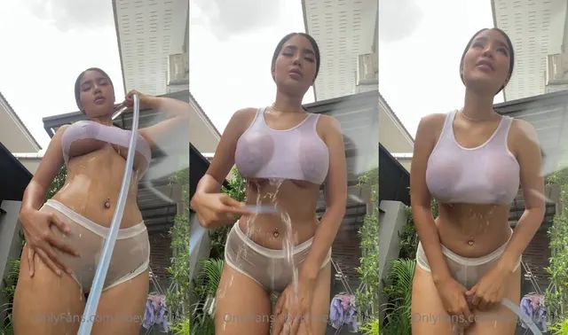 Noey_Yanisa Showers Outside With A Water Hose